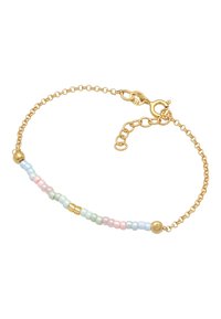 Bracelet en chaîne dorée avec des perles pastel de couleur rose, bleue, verte et accents dorés. Équipé d'un fermoir mousqueton et d'une longueur réglable. Design simple.