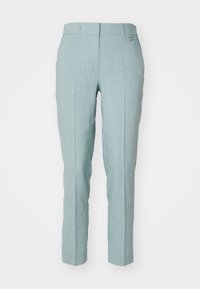 Vaaleansinisen pellavahousut, suora malli, litteä etuosa ja vyölenkit. Ominaisuuksina siisti ompelu ja sileä kangas.