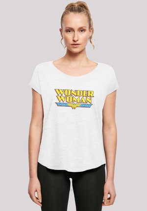 White short-sleeve t-shirt featuring a vibrant yellow and blue "Wonder Woman" graphic design at the front. Casual fit with a rounded neckline.