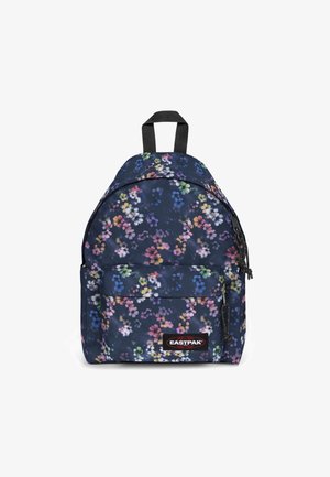 Laivaston sininen reppu, jossa on vaaleanpunaisia, purppuran ja vihreitä kukkakuoseja. Varustettu etutaskulla ja säätömahdollisuudella varustetuilla mustilla olkahihnoilla. Valmistettu kestävästä kankaasta.