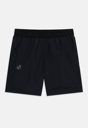 Čierne atletické šortky s elastickým pásom a bočnými vreckami, s malým tónovaným logom na ľavej nohe.