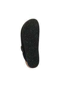 Sole di scarpa in suede nera con un fondo in gomma testurizzata, dotato di una presa a motivo e una fascia laterale per una vestibilità sicura.