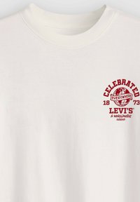 Non sélectionné, lse batwing badge ca - tans