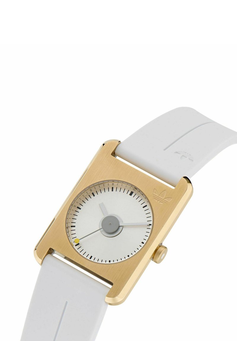 Gold-tone rectangular watch with a white dial, gray hour hand, and white rubber strap. Features minimal black markings and branding.