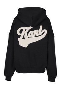 Felpa nera con cappuccio e maniche lunghe. Presenta un grande logo beige "Kani" sul retro. Il materiale sembra morbido e strutturato.