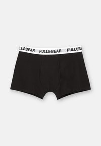 Sorte bomulds boxershorts med en hvid elastisk talje, der har "PULL&BEAR" i sort tekst. Glat tekstur og tætsiddende design.