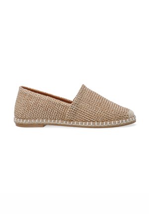 Woven beige espadrille with a rounded toe, white stitching along the sole, and a flat, flexible jute footbed. Breathable construction.