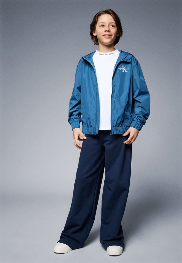 MONOLOGO ESSENTIAL JACKET UNISEX - Light jacket3