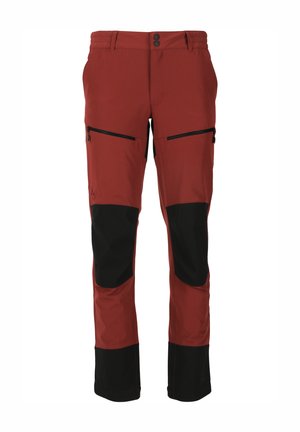Red ski pants with black accents, featuring a tapered shape, two zippered pockets, durable fabric, and reinforced knee sections.