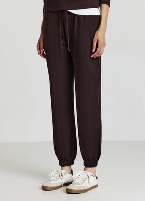 Calliope Pantaloni sportivi - marrone scuro