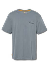 Šedé bavlněné tričko s krátkým rukávem, s černým logem "Timberland" na levé hrudi a oranžovými akcenty na límci.