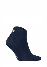 Mørkeblå ankelstrømpe med ribbet kant, glat tekstur og minimalistisk design. Har hvid branding på siden.