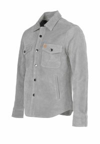 Szürke velúr dzseki gombos előlappal, két mellzsebbel, oldalzsebekkel és egy diszkrét logóval a bal mellrészen. Simább tapintású.