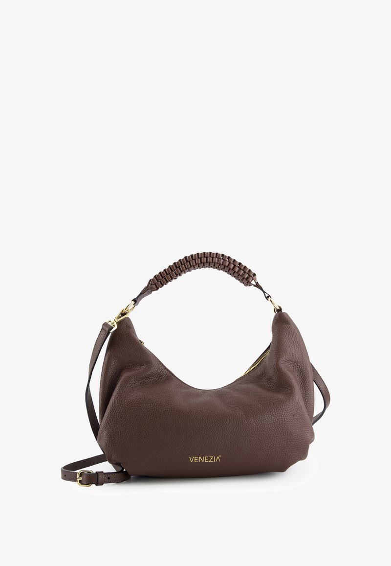 Brown, textured leather handbag with a curved shape. Features a braided top handle, adjustable strap, and a gold zipper accent. "Venezia" logo visible.