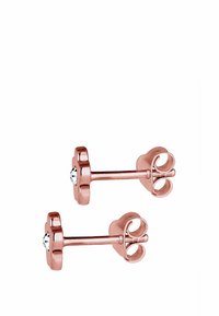 Orecchini a perno in oro rosa a forma di fiore, con una pietra preziosa trasparente al centro, finitura liscia e sicura chiusura a farfallina.