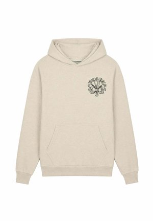 Sudadera con capucha beige con bolsillo delantero y emblema negro de fleur-de-lis en el área izquierda del pecho.
