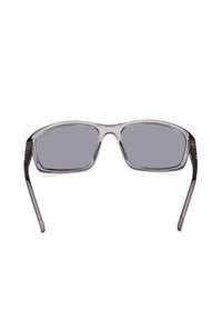 Gafas de sol grises con un marco rectangular y lentes oscuros. El marco está hecho de plástico ligero con una textura suave.