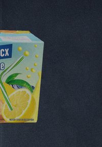 Juice carton with pastel blue and yellow design, featuring a green straw, lemon slices, and yellow bubbles, set against a dark background.