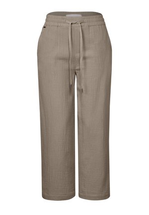 Béžové kalhoty s širokými nohavicemi vyrobené z texturované látky s elastickým pasem a šnůrkou na stažení. Obsahují kovové koncovky na šňůrce.