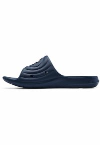 Chancla de color azul marino con un diseño curvado y texturizado, que presenta agujeros de ventilación y una planta suave. Fabricada con material sintético duradero.