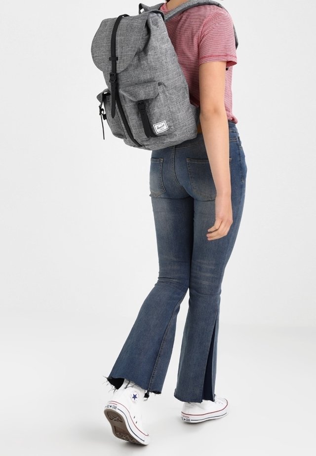 grey herschel backpack on a person Herschel Rucksack - mottled dark grey - (Pre-owned)