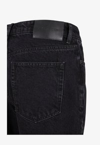 Sélectionné, washed black