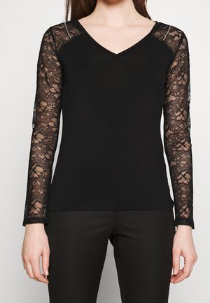 Camiseta de manga larga - black