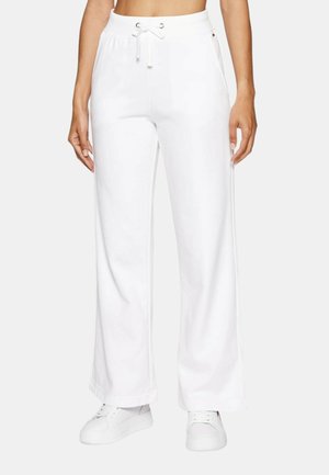 Pantaloni della tuta bianchi a gamba larga, realizzati in morbido tessuto, con vita regolabile tramite coulisse, tasche laterali e una superficie liscia.