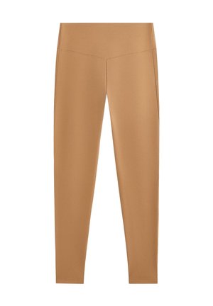 Høj talje, leggings i fuld længde i tan med en glat, sømløs finish og tonale syninger langs taljebåndet og siderne.