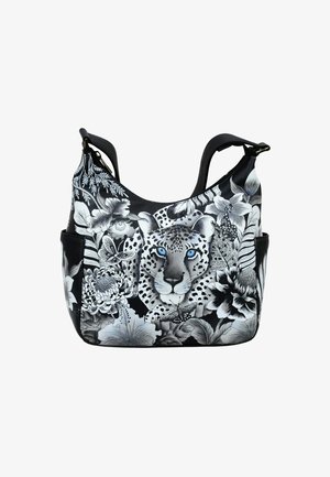 Zwarte handtas met een luipaarddesign en blauwe ogen, omringd door grijze bloemenmotieven. Gemaakt van gestructureerd synthetisch materiaal.