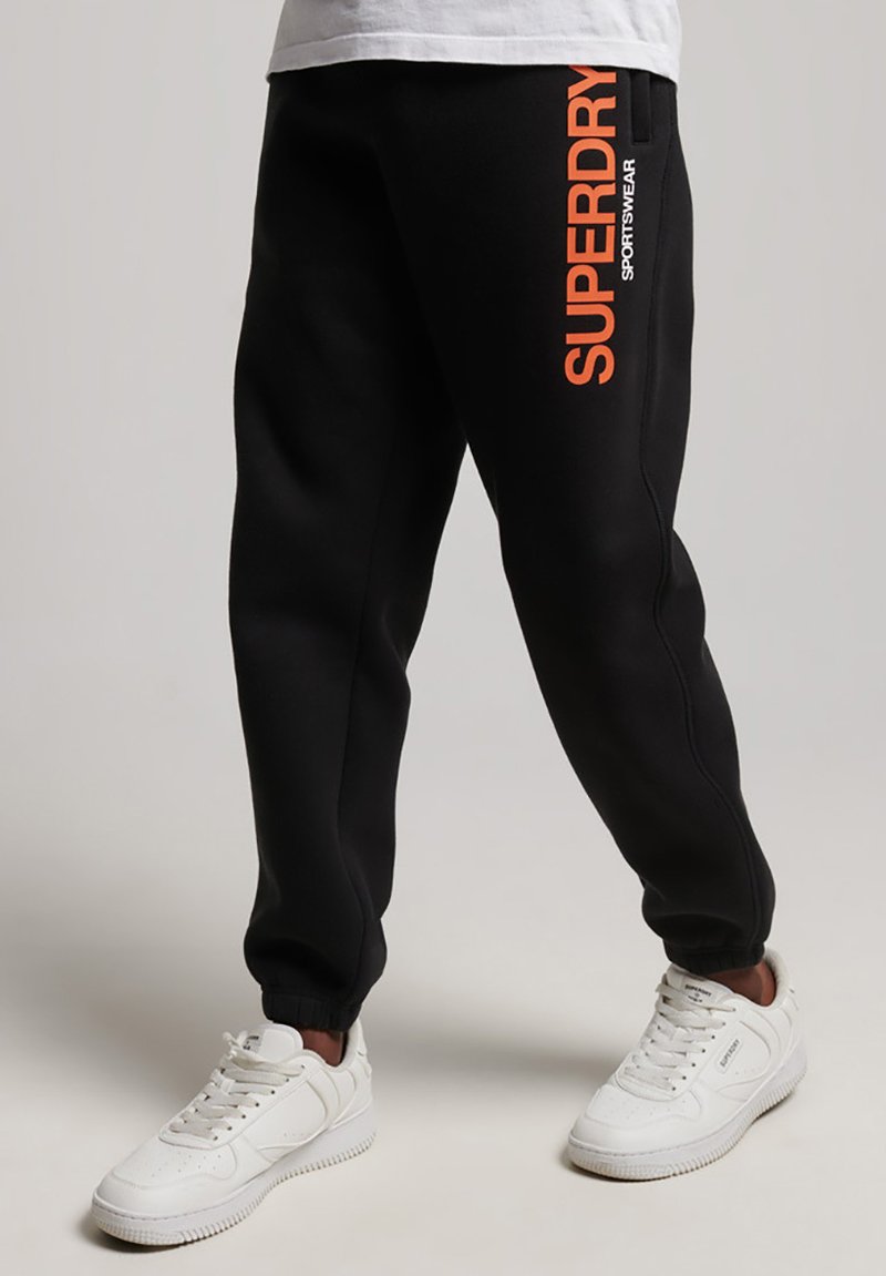 Superdry SPORTSWEAR Tracksuit bottoms black Zalando.co.uk