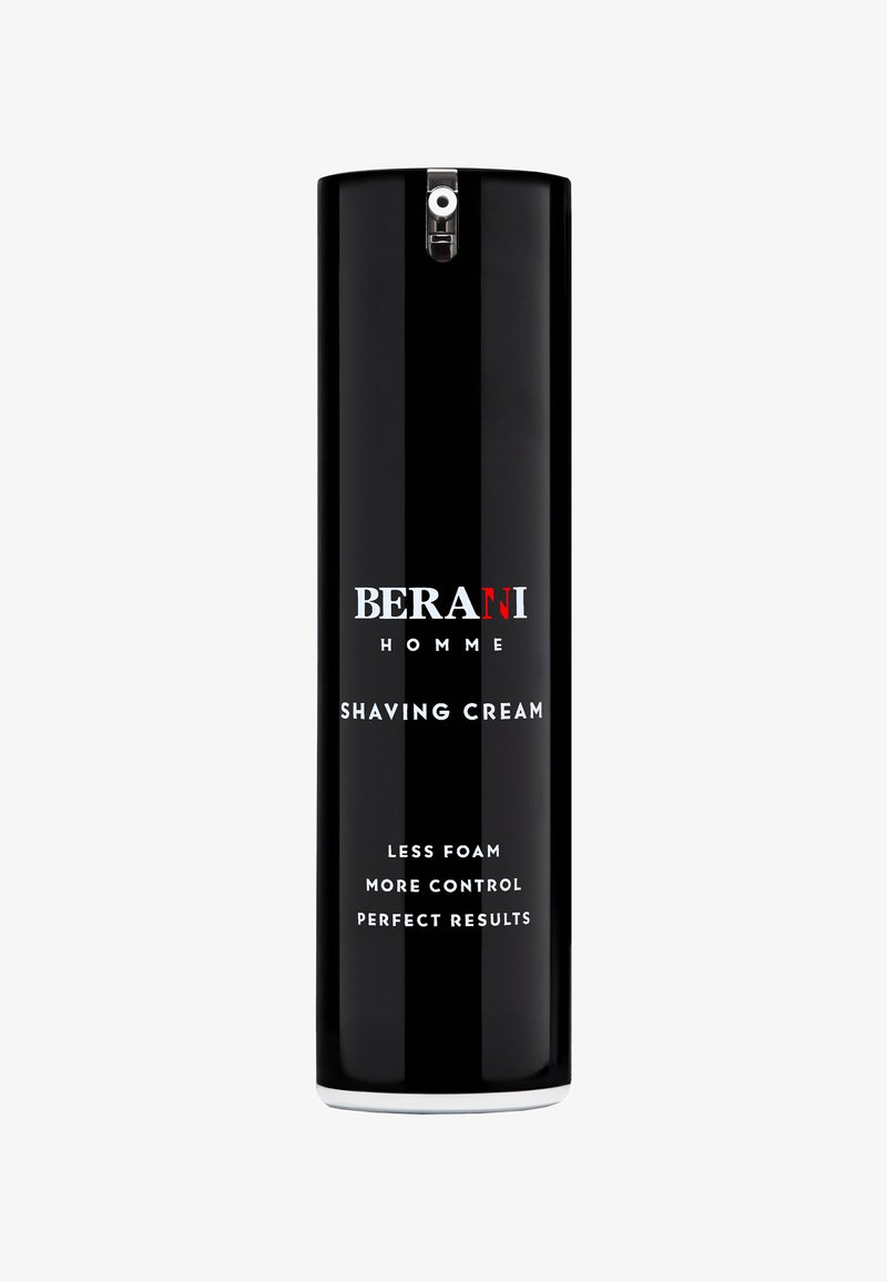 Czarny cylindryczny pojemnik na piankę do golenia z błyszczącym wykończeniem, z białym napisem zawierającym markę i instrukcje użycia.