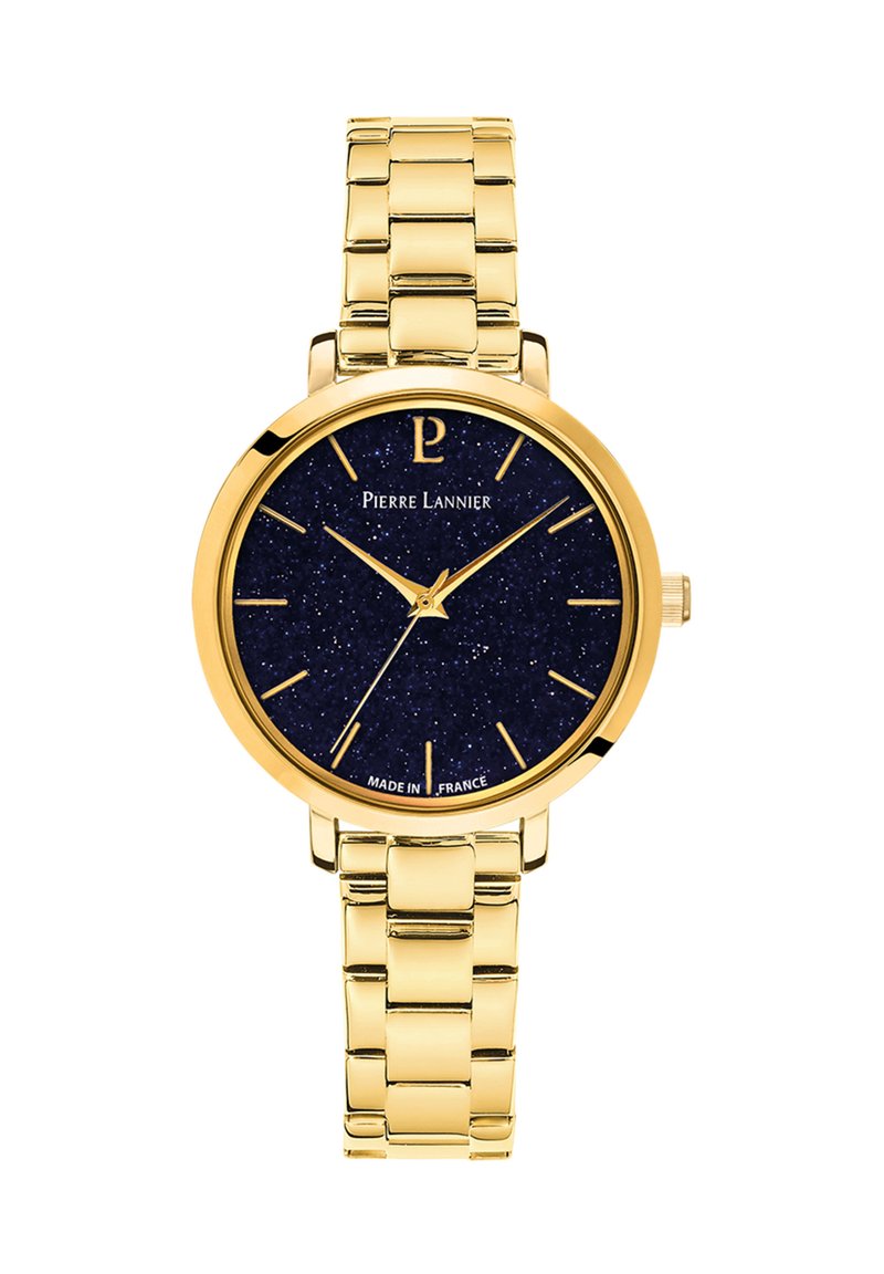 Reloj de pulsera de metal dorado con una esfera en azul marino con un acabado brillante, manecillas doradas y marcadores de horas. Correa estilo pulsera con eslabones pulidos.