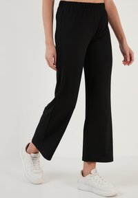 LELA REGULAR FIT - Hlače - black