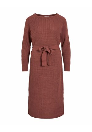 Neulemekko ruosteenvärisenä, jossa pitkät hihat, pyöreä pääntie ja itsesitova vyö vyötäröllä. Mekossa on teksturoitu kuvio ja resorit hihansuissa.