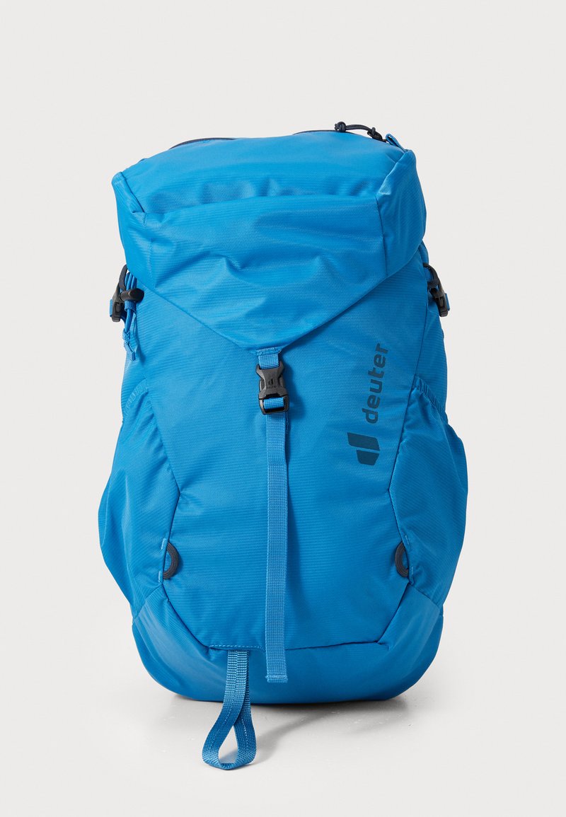 Blue backpack with a roll-top design, made of durable fabric. Features buckles, adjustable straps, and logo detail on the side.
