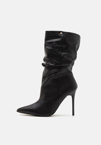 Korolliset saappaat - black