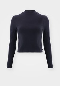 Marineblå langermet crop topp med høy hals. Laget av myk stoff, har en tettsittende design, subtil søm og ingen synlige mønstre eller detaljer.