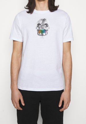 White cotton T-shirt featuring a colorful skull graphic on the front, with detailed shading and text beneath. Simple crew neckline.
