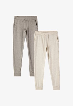 Dwie pary dresów: jedne szare, a drugie beżowe. Obie mają elastyczne pasy, sznurki, boczne kieszenie i zwężane nogawki.