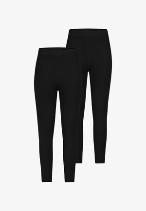 Schwarze, gerippte Leggings mit elastischem Bund und figurbetontem Design, die eine glatte Textur und eine maßgeschneiderte Silhouette zeigen.