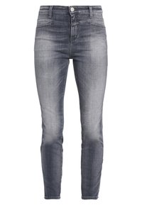 Jeans ajustados en un lavado gris medio, con un diseño clásico de cinco bolsillos, un cierre de botón metálico y un sutil desgaste en los muslos.