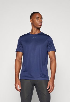 Navy blue athletic t-shirt in a smooth, lightweight fabric with short sleeves and a crew neckline; features a reflective logo on the chest.