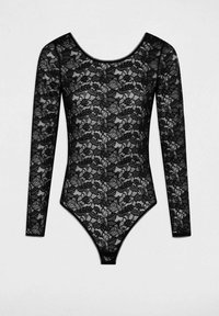 Body in pizzo nero con maniche lunghe, motivo floreale, scollatura a barchetta, tessuto trasparente, rifinito con un bordo lungo il collo.