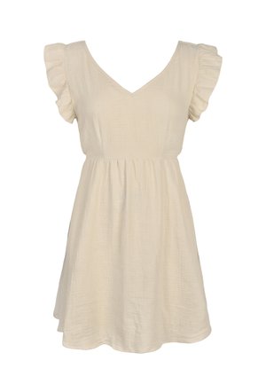 Korte, crèmekleurige jurk met een V-hals, ruches aan de mouwen en een verzamelde taille, gemaakt van lichte stof met een zachte textuur.