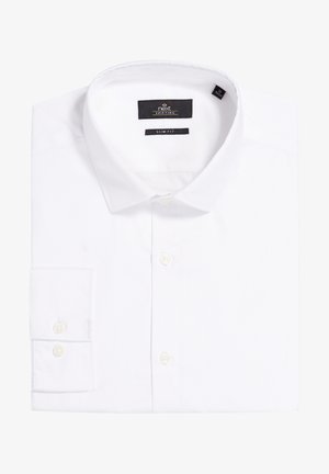 Bílá slim-fit košile vyrobená z hladké bavlněné látky, s klasickým límečkem, zapínáním na knoflíky a manžetami na dva knoflíky. Viditelná značka.