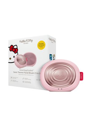 Brosse faciale thermique sonique 5-en-1 Hello Kitty rose avec boîte mettant en avant des caractéristiques comme le réchauffement profond et le nettoyage du visage.