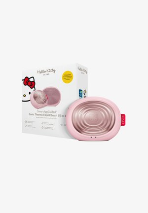 Roze Hello Kitty 5-in-1 sonische thermo gezichtsborstel met doos waarin kenmerken zoals diepe verwarming en gezichtsreiniging worden benadrukt.