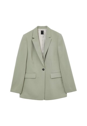 Blazer su misura verde chiaro con un singolo bottone nero, collo a lancia e due tasche frontali. Tessuto liscio con una forma strutturata.