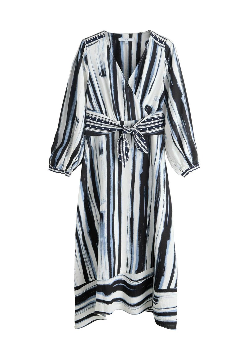 Apvijuma tipa kleita ar melnu un baltu otu vilkumu rakstu, garām piedurknēm un jostu ar kontrastējošu raksturētu joslu.